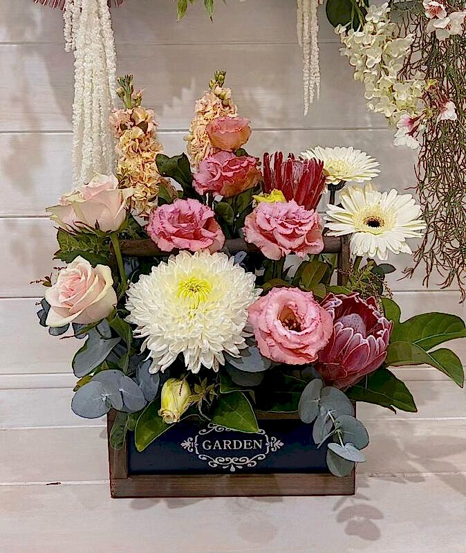 pastel flower arrangement in wooden box – Flowers of Southport